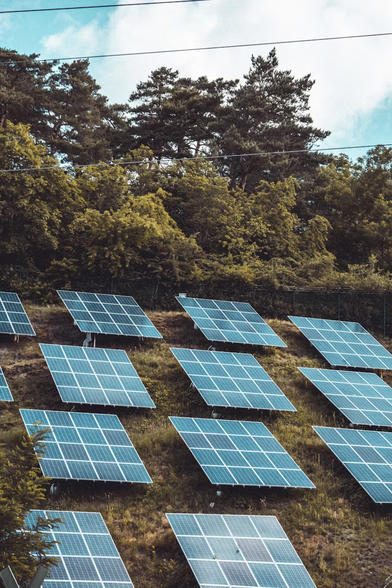 Solar technicians inspecting system performance for uptime assurance